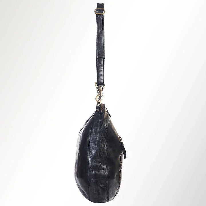 Premium full grain leather Spaghetti Western hobo bag with adjustable strap and durable antique metal fittings.