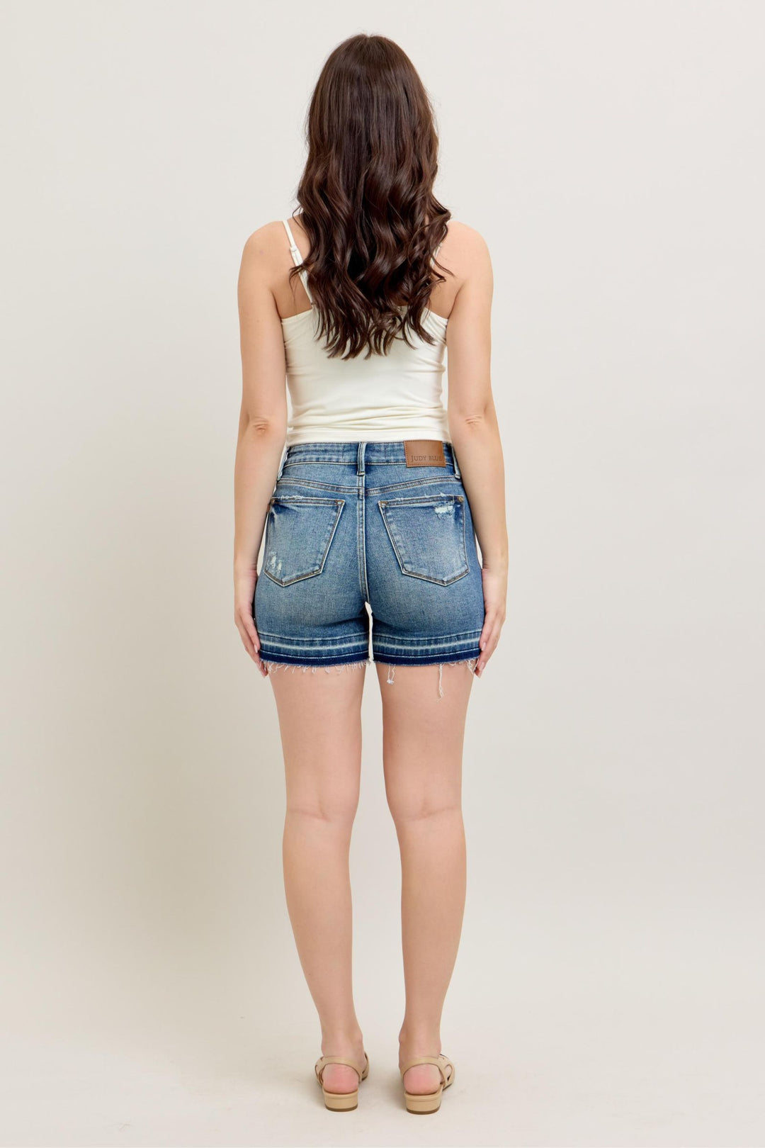 Judy Blue Shorts mid rise tummy control vintage wash release hem with 4.5 inch inseam and 10 inch front rise in cotton blend fabric