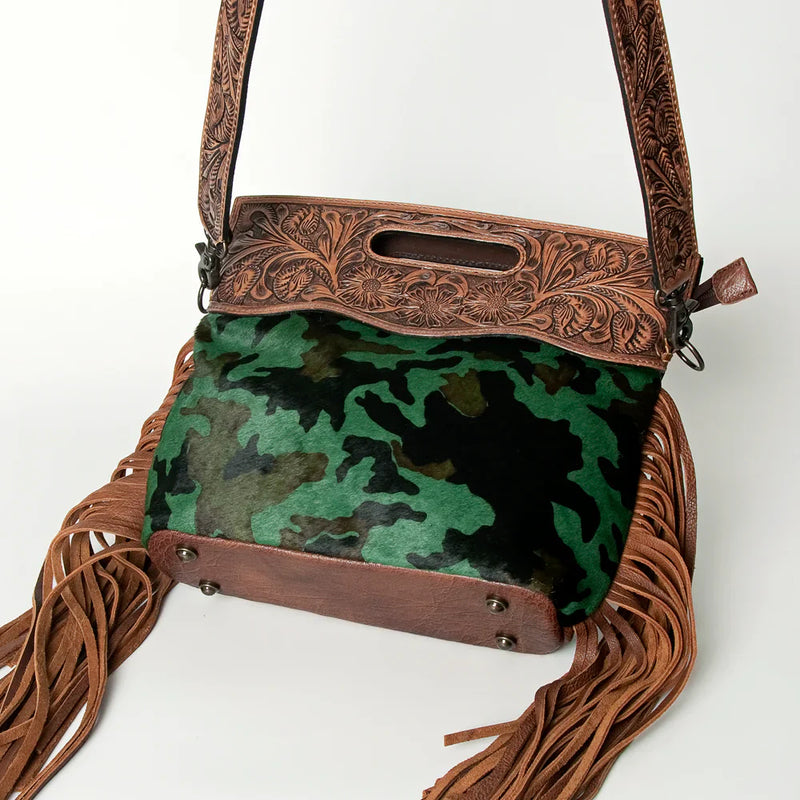 American Darling Clutch Handbag ADBGS146AA in hand-tooled vegetable tanned leather with green camouflage hair-on cowhide, leather fringes, and adjustable strap