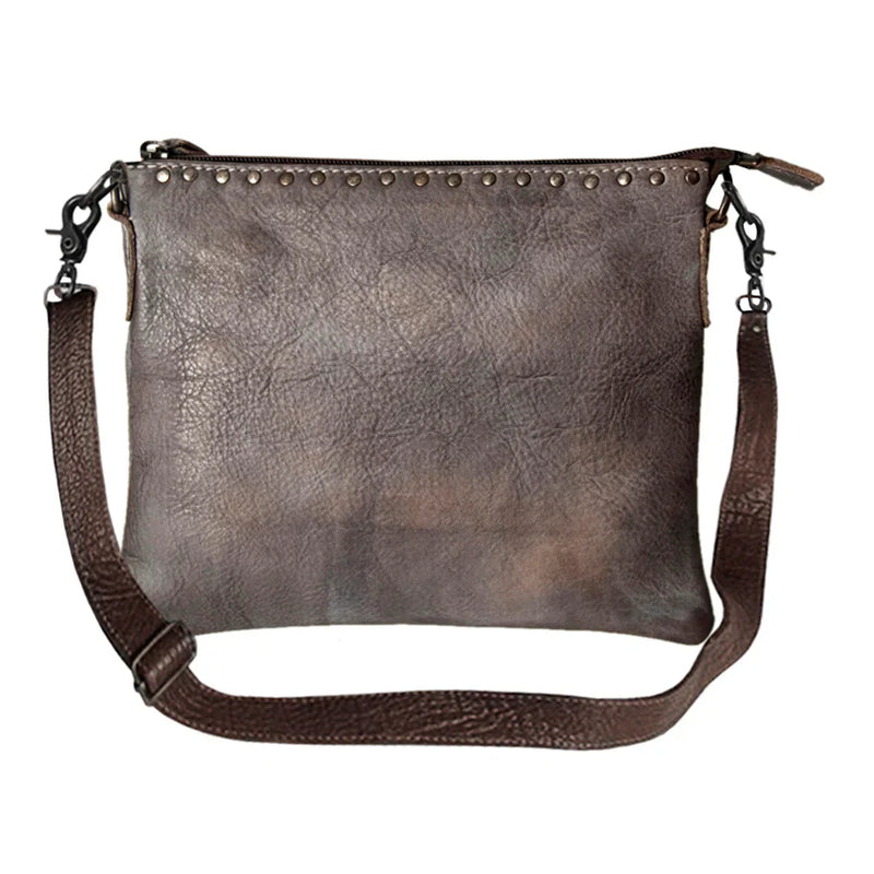 Premium full grain leather crossbody bag NMBG117C with adjustable strap and antique finish fittings.