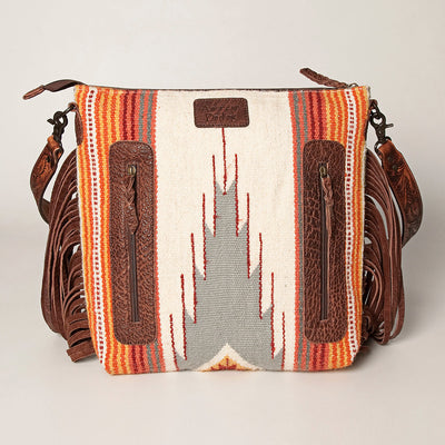 American Darling Shoulder Bag ADBGZ365A with hand tooled vegetable tanned leather, wool saddle blanket design, leather fringes, and adjustable leather strap