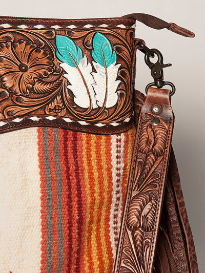 Close-up of American Darling Shoulder Bag ADBGZ365A featuring detailed leather tooling and colorful woven fabric with feather design accents