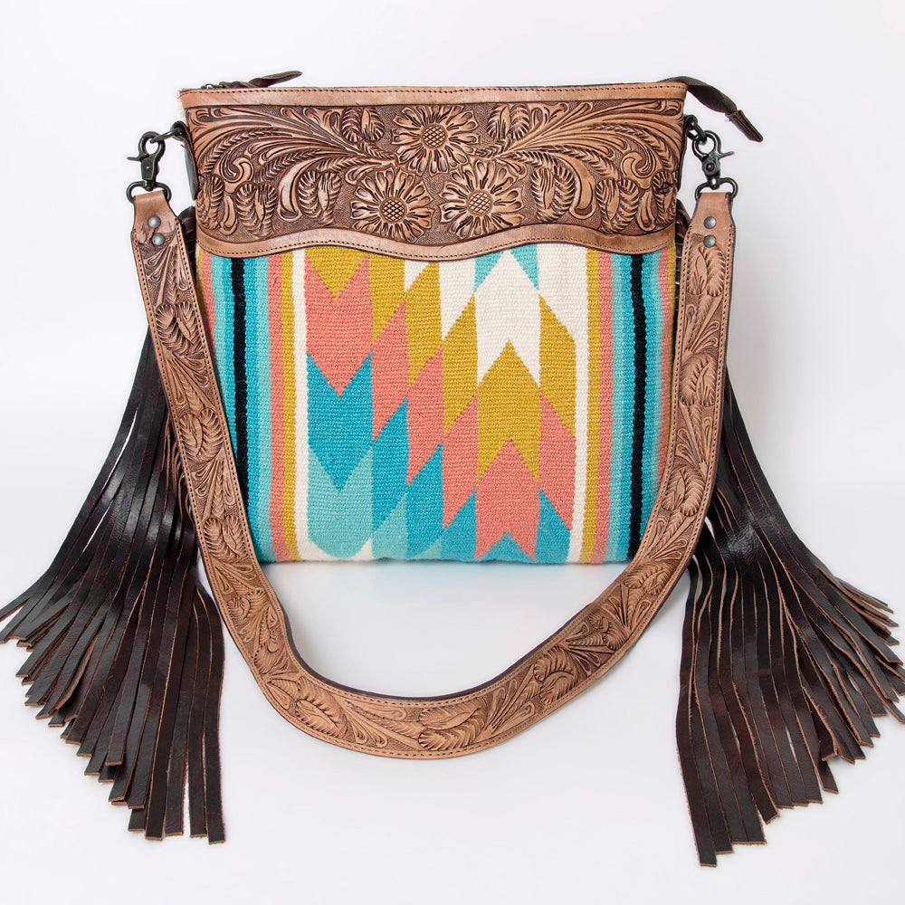 American Darling large crossbody messenger bag handcrafted with tooled leather and colorful woven wool saddle blanket, featuring leather fringes and adjustable strap