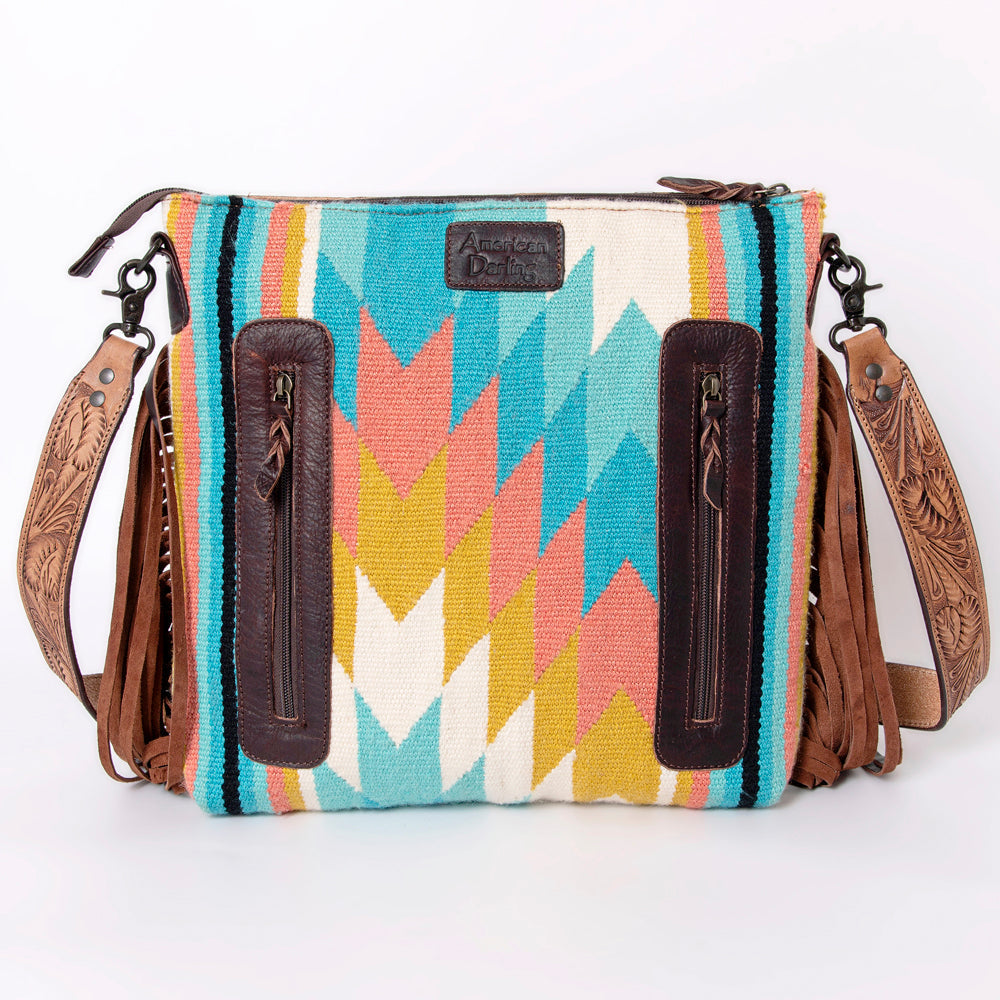 American Darling large crossbody messenger bag with hand-tooled leather, colorful woven wool blanket pattern, and leather fringes