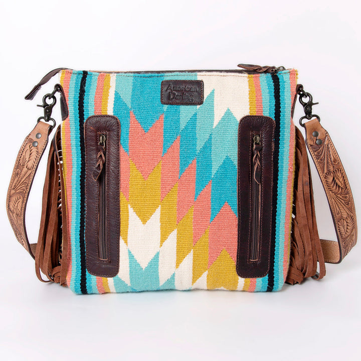 American Darling large crossbody messenger bag with hand-tooled leather, colorful woven wool blanket pattern, and leather fringes