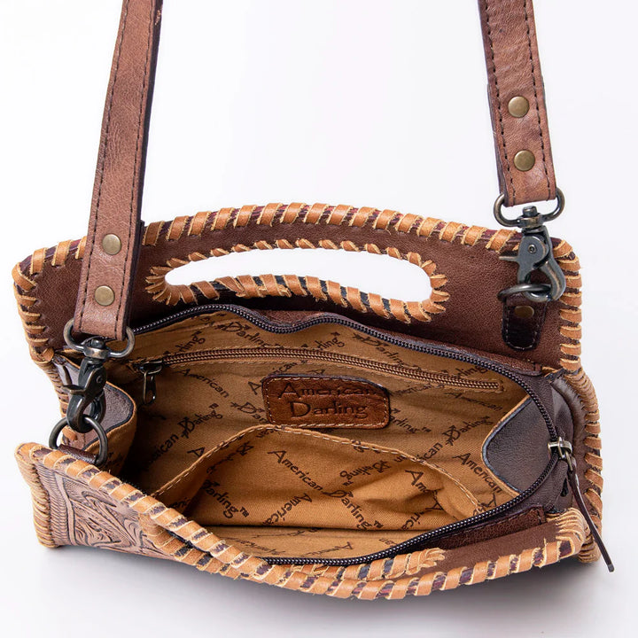 American Darling Small Crossbody Bag handcrafted leather with adjustable strap and detailed braiding interior view