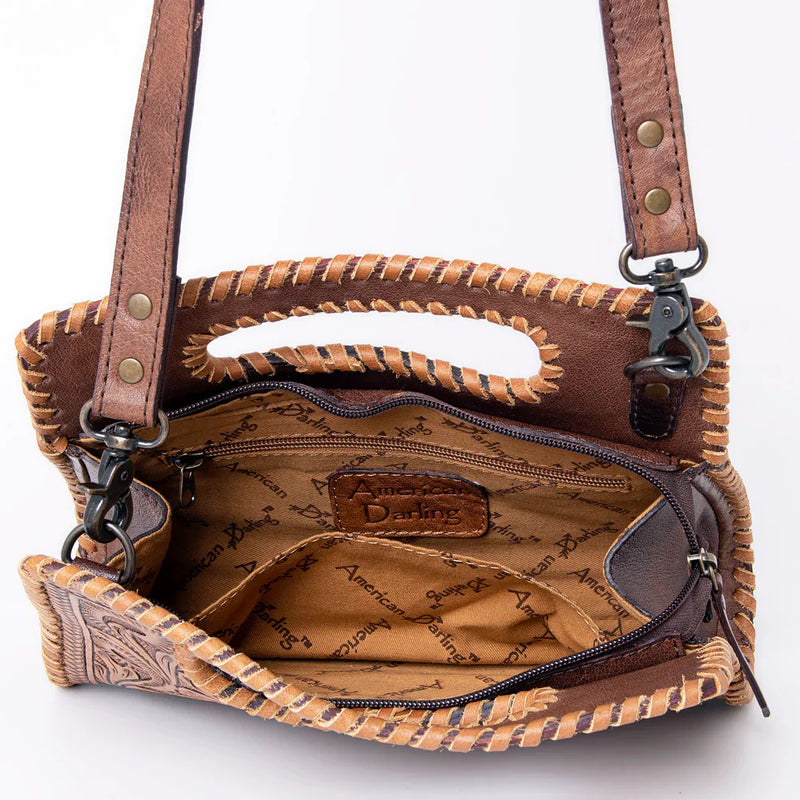 American Darling Small Crossbody Bag handcrafted leather with adjustable strap and detailed braiding interior view