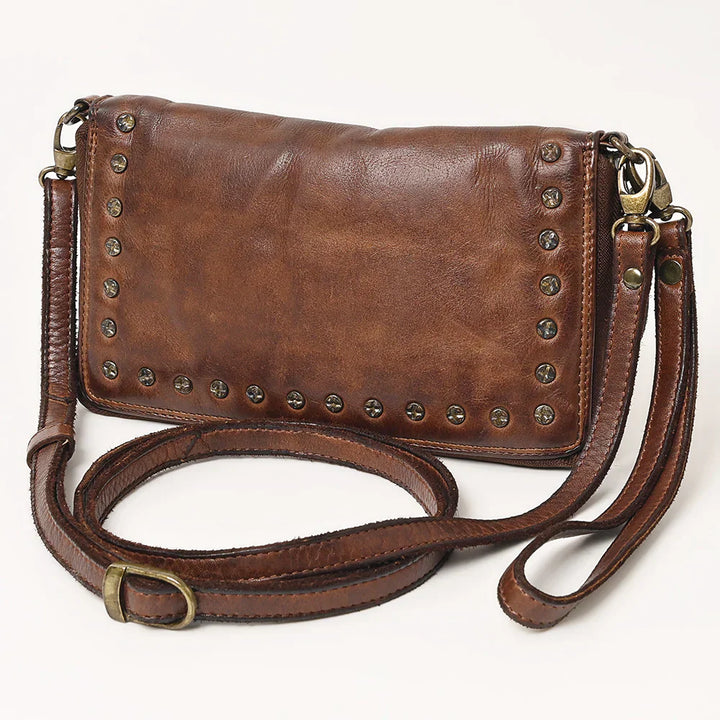 Spaghetti Western Crossbody Wallet in brown full grain leather with adjustable strap and antique metal rivets