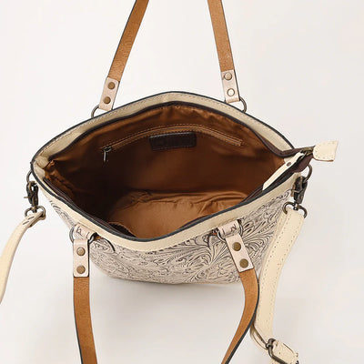 Ohlay Tote KBG328 with hand-tooled leather design and adjustable strap.