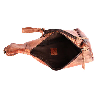 Open top view of Never Mind Sling bag made of premium full grain leather with antique finish metal fittings and adjustable leather strap