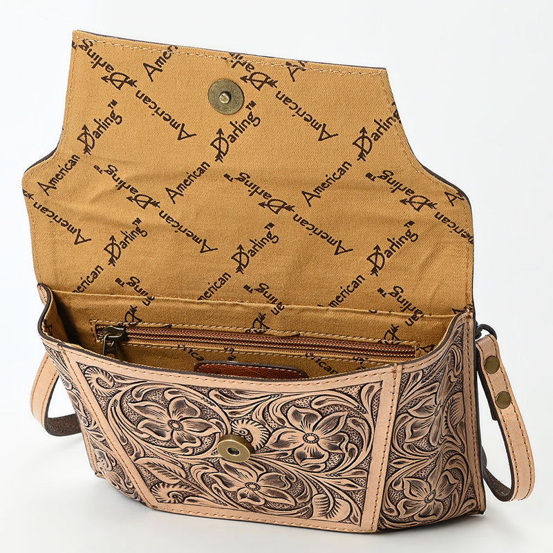 American Darling Small crossbody bag in vegetable tanned full grain leather with hand-tooled floral design and adjustable strap