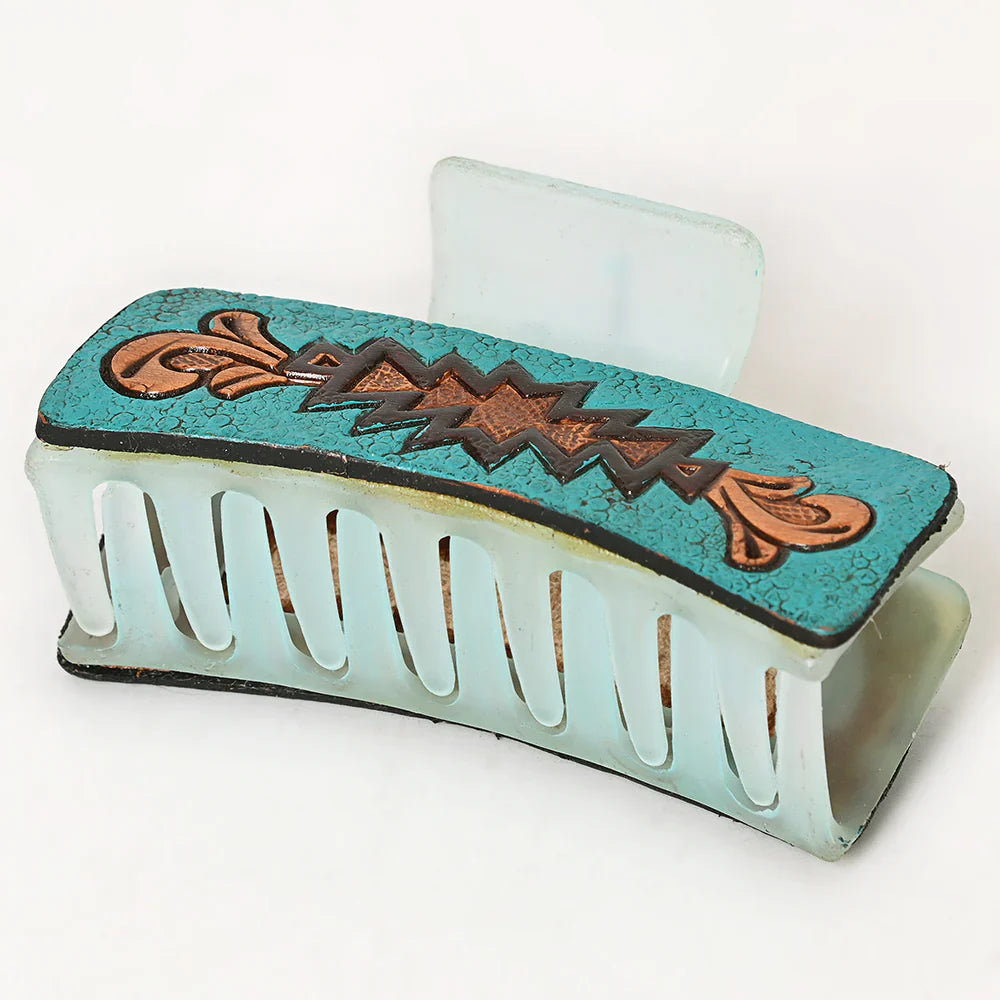 American Darling turquoise hair clutch with decorative pattern.