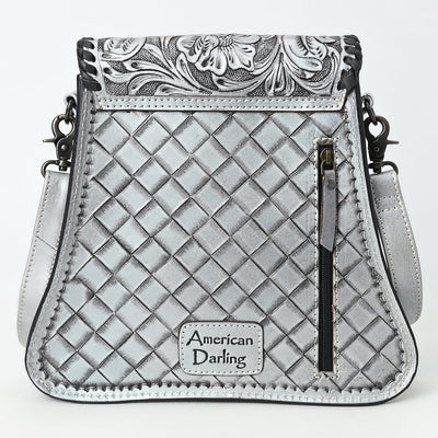 American Darling small crossbody bag in silver full grain leather with hand-tooled floral design, braided details, antique metal fittings, and adjustable shoulder strap