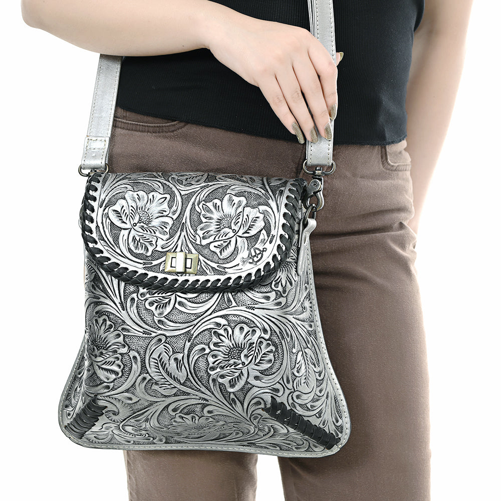 American Darling Small Crossbody Bag in hand-tooled vegetable tanned genuine cowhide leather with floral carving, adjustable leather strap, and antique metal fittings