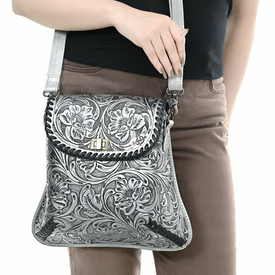 American Darling Small Crossbody Bag in hand-tooled vegetable tanned genuine cowhide leather with floral carving, adjustable leather strap, and antique metal fittings