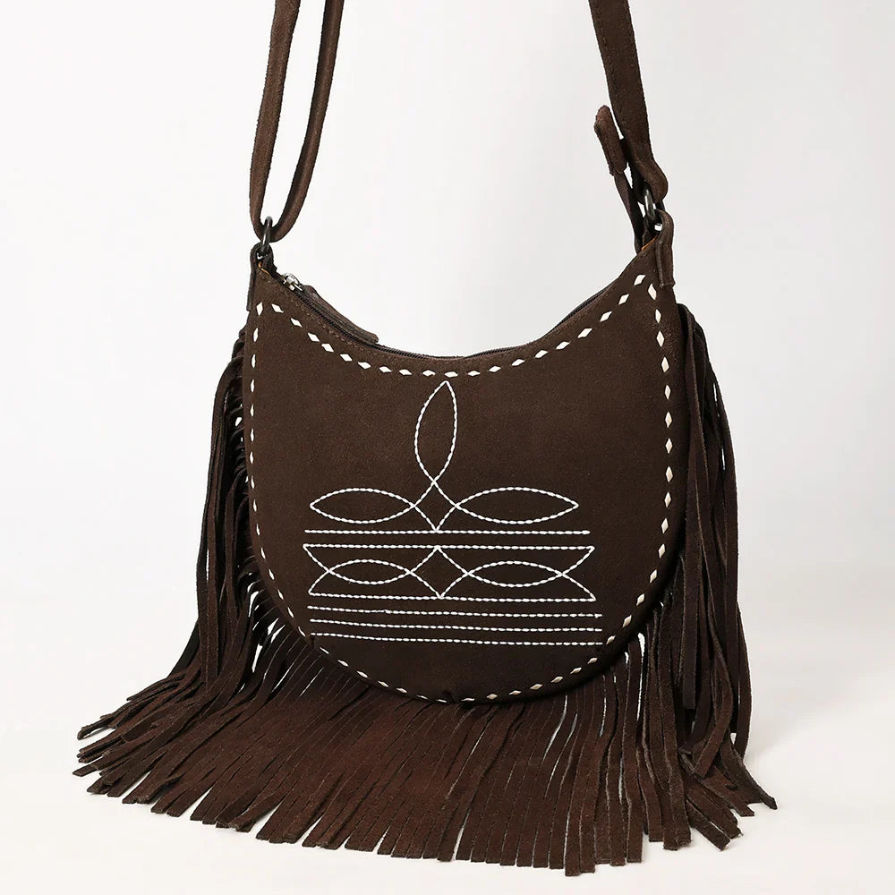 American Darling crossbody genuine leather bag with Western design, hand-tooled patterns, and fringe detailing.