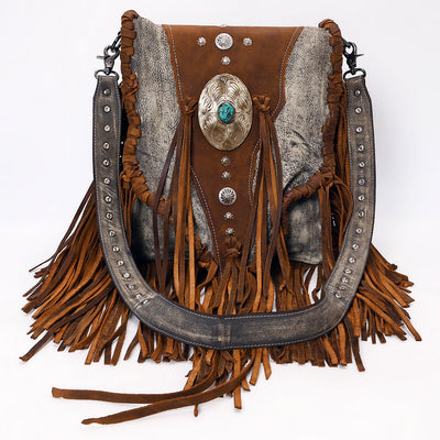 American Darling Crossbody Bag in full grain leather with turquoise stone, leather fringes, adjustable strap, and antique metal fittings
