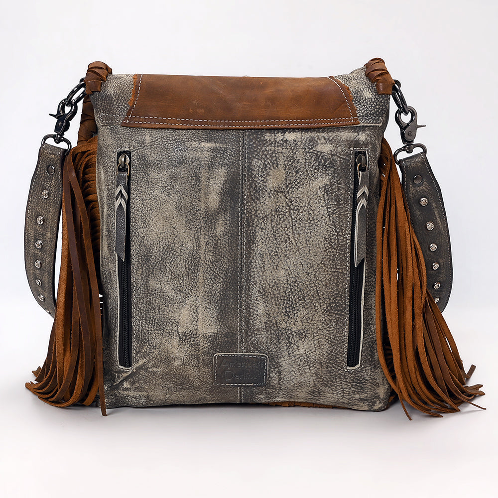 American Darling Crossbody Bag in distressed gray leather with brown genuine leather fringes and adjustable strap, featuring antique metal fittings and turquoise stone accents.
