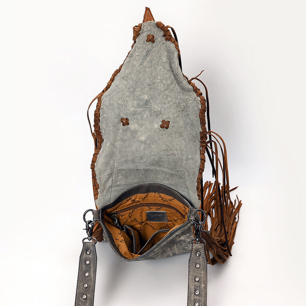 American Darling crossbody bag in soft full grain leather with western fringes, adjustable strap, antique metal fittings, turquoise stone accent, and durable YKK zipper closure.