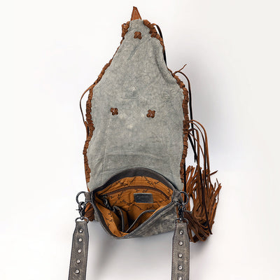 American Darling crossbody bag in soft full grain leather with western fringes, adjustable strap, antique metal fittings, turquoise stone accent, and durable YKK zipper closure.