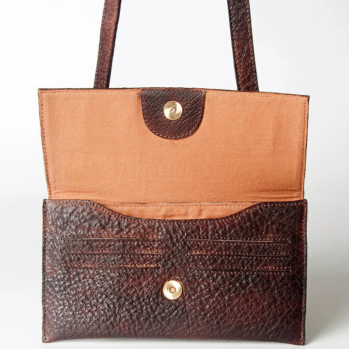 Never Mind Small Crossbody Bag in premium full grain leather with antique finish metal fittings.