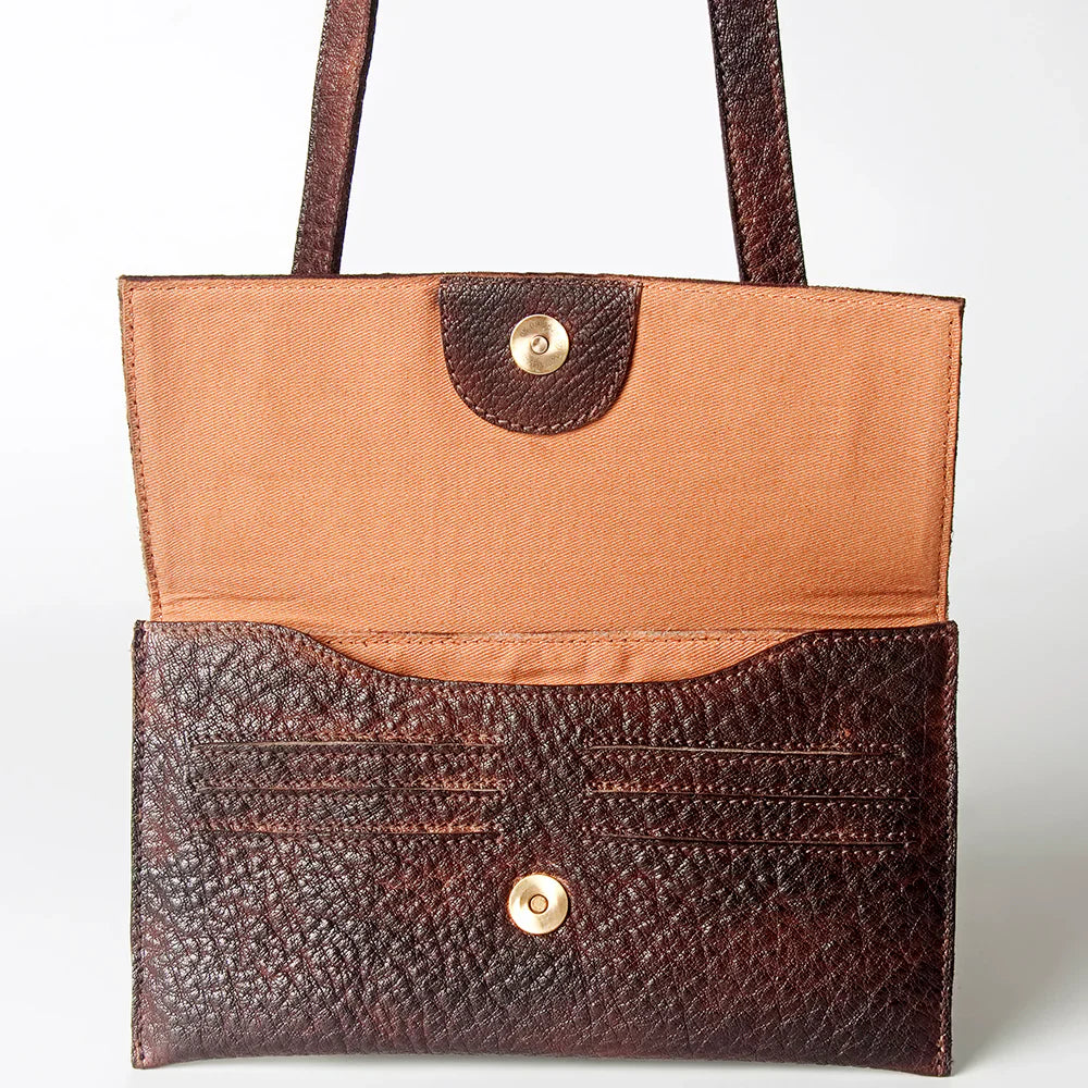 Never Mind Small Crossbody Bag in premium full grain leather with antique finish metal fittings.