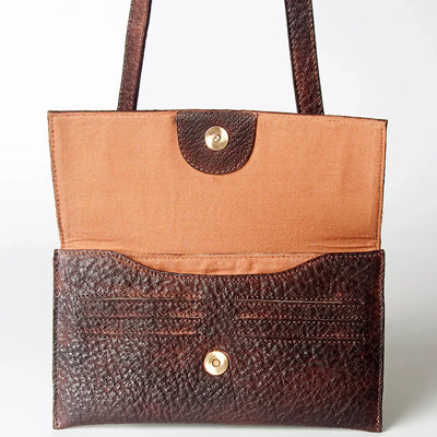 Never Mind Small Crossbody Bag in premium full grain leather with antique finish metal fittings.