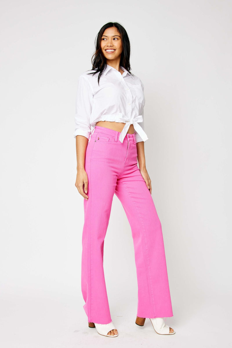 Woman wearing Judy Blue Jeans high waist hot pink 90s straight leg jeans