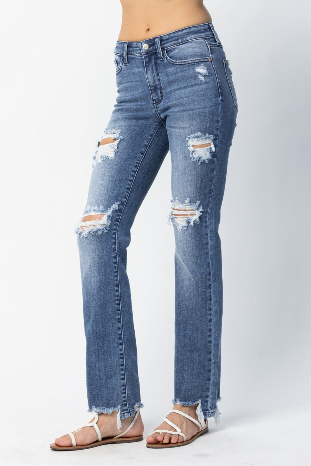 Judy Blue Jeans 82425 destroyed straight mid-rise denim with 9.75" rise and 32" inseam, modeled by woman size 1, 5'10" tall