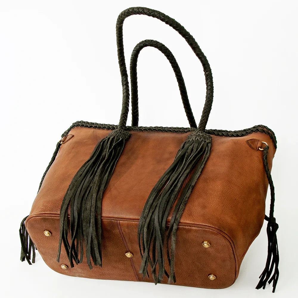 American Darling Tote Bag ADBGD132A made of genuine full grain leather with fringes and adjustable strap.