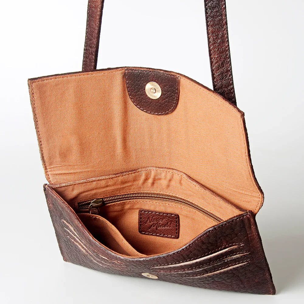 Never Mind Small Crossbody Bag with premium full grain leather and YKK zipper.