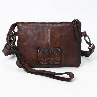 Premium full grain leather crossbody bag with adjustable strap and antique metal fittings.