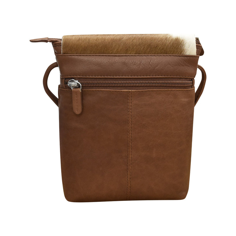 Small Canada Bag in genuine toffee leather with front zip pocket and haircalf flap detail