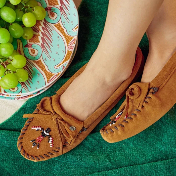 Pre Order Minnetonka THUNDERBIRD SOFTSOLE moccasins with iconic Thunderbird beading, featuring tan suede and cotton lace detailing.