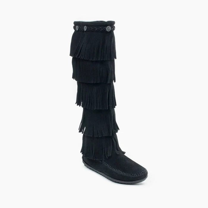 Black Minnetonka 5-layer fringe boot for women with suede braiding, metal conchos, padded insole, inside zipper, and rubber sole