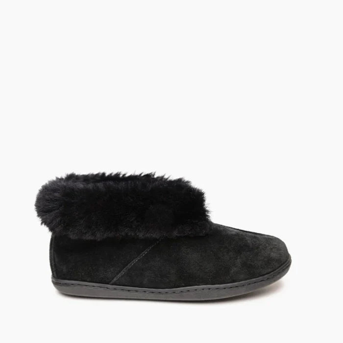 Minnetonka Sheepskin Ankle Boot in black suede with foldable collar and rubber sole.