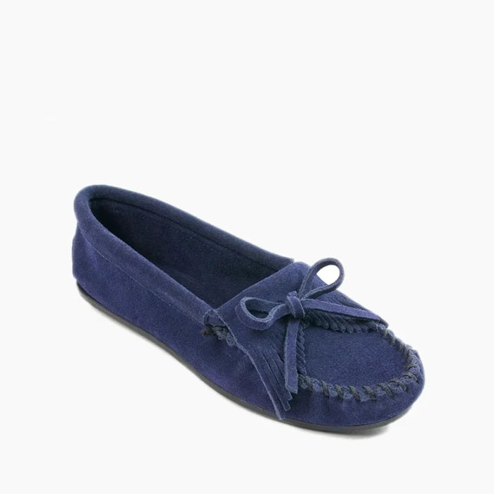 Minnetonka Kilty Hardsole Moccasin in navy suede with intricate stitching and durable rubber sole.