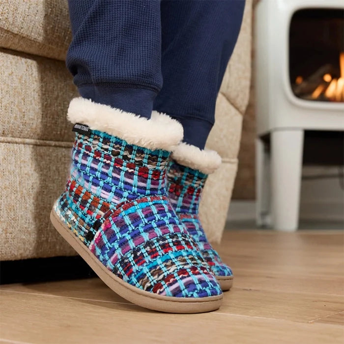 Cozy Minnetonka Betty memory foam slippers with colorful knit design and plush lining.