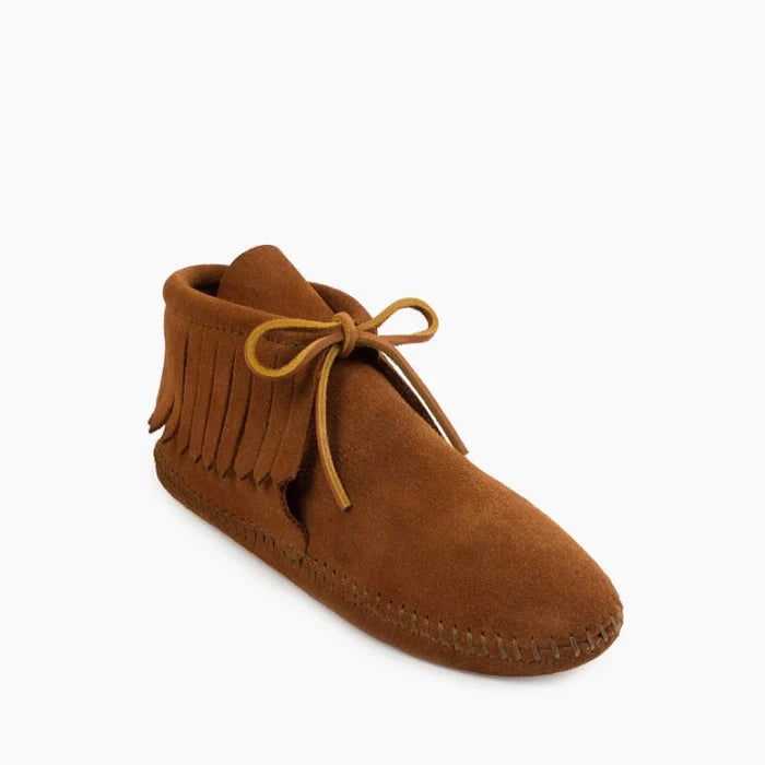 IN SHOP Minnetonka Classic Fringe Boot for women in brown suede with fringe and rawhide lace, available in hardsole and softsole options.