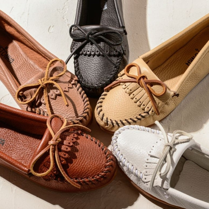 Minnetonka DEERSKIN leather moccasin shoes for women in multiple colors with rawhide lace and rubber soles