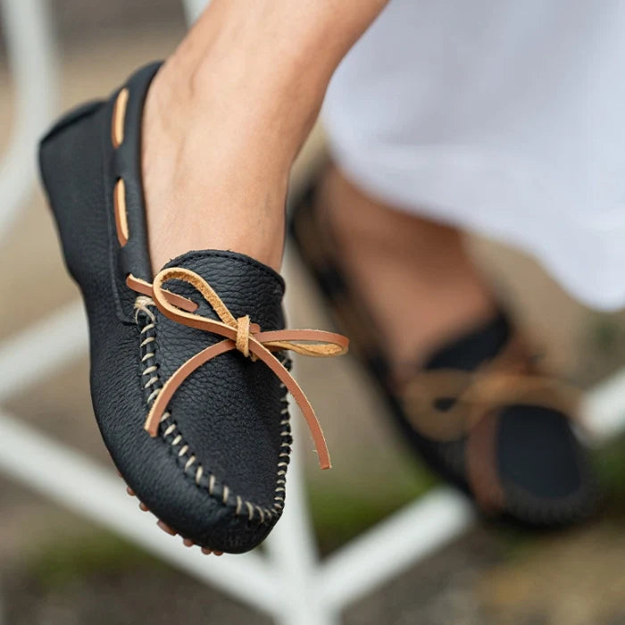 Minnetonka CLASSIC DRIVER for Women - handcrafted leather moccasins with rawhide lace, padded insole, and durable rubber sole.