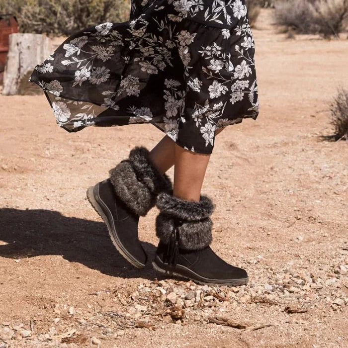 Minnetonka EVERETT SHOES with premium suede and faux fur collar, worn by a person in a desert landscape.