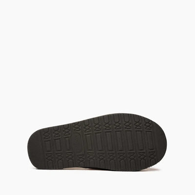 Sole view of Minnetonka Chesney Cozy Suede Slippers with durable EVA material.