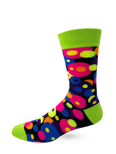 Colorful men's crew sock with abstract circular patterns and bright green cuff, heel, and toe, novelty Holy S*** Balls phrase style