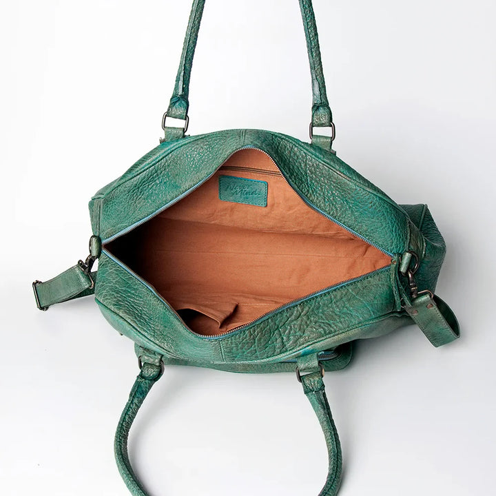 Never Mind Tote NMBGZ121B in green, showcasing unique hand-dyed leather and spacious interior.