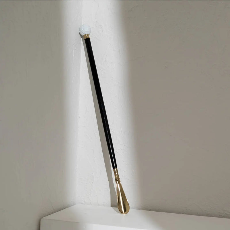 29-inch black wooden shoehorn with metal handle and sleek spray-painted finish for easy shoe wearing without bending