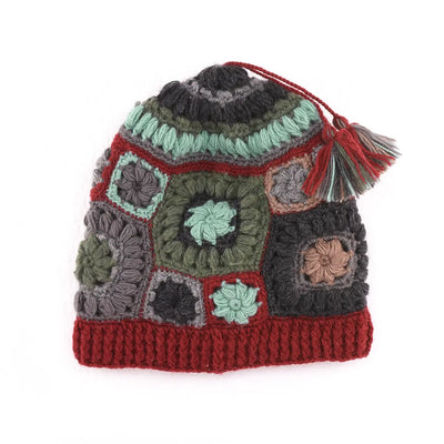Aria Wool Crochet Slouch Hat with multicolored crochet squares and double tassel detail.
