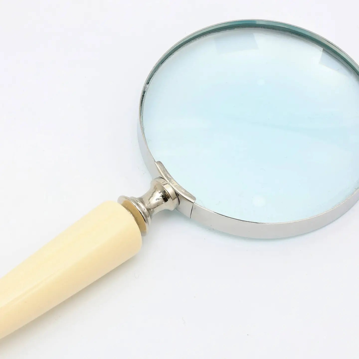 Gift-ready packaging box for decorative magnifying glass with ivory resin handle and silver finish