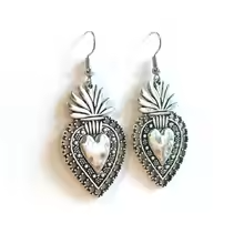 Silver Sacred Heart statement earrings with intricate design and tarnish-resistant finish.