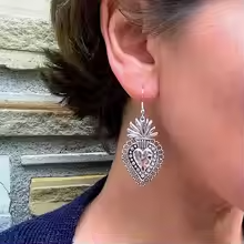 Silver Sacred Heart statement earrings with large drop design, inspired by Milagro charms, silver-plated, artistic and bold look.